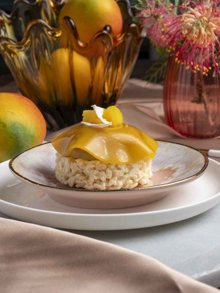 Mango sticky rice entremet with coconut mousse and draped mango veil