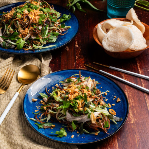 Vietnamese banana blossom salad with poached chicken, fresh herbs and fried shallots